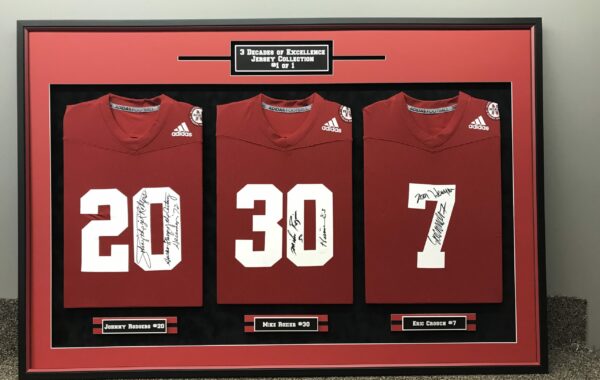 3 Nebraska Heisman Signed Jerseys in one Frame